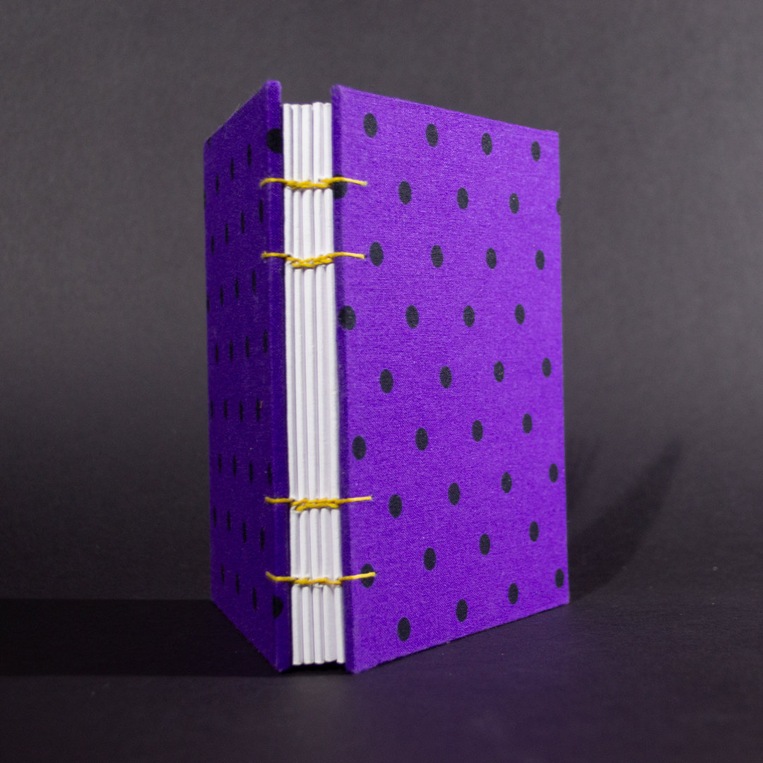Purple polkadot octavo Coptic bound journal spine