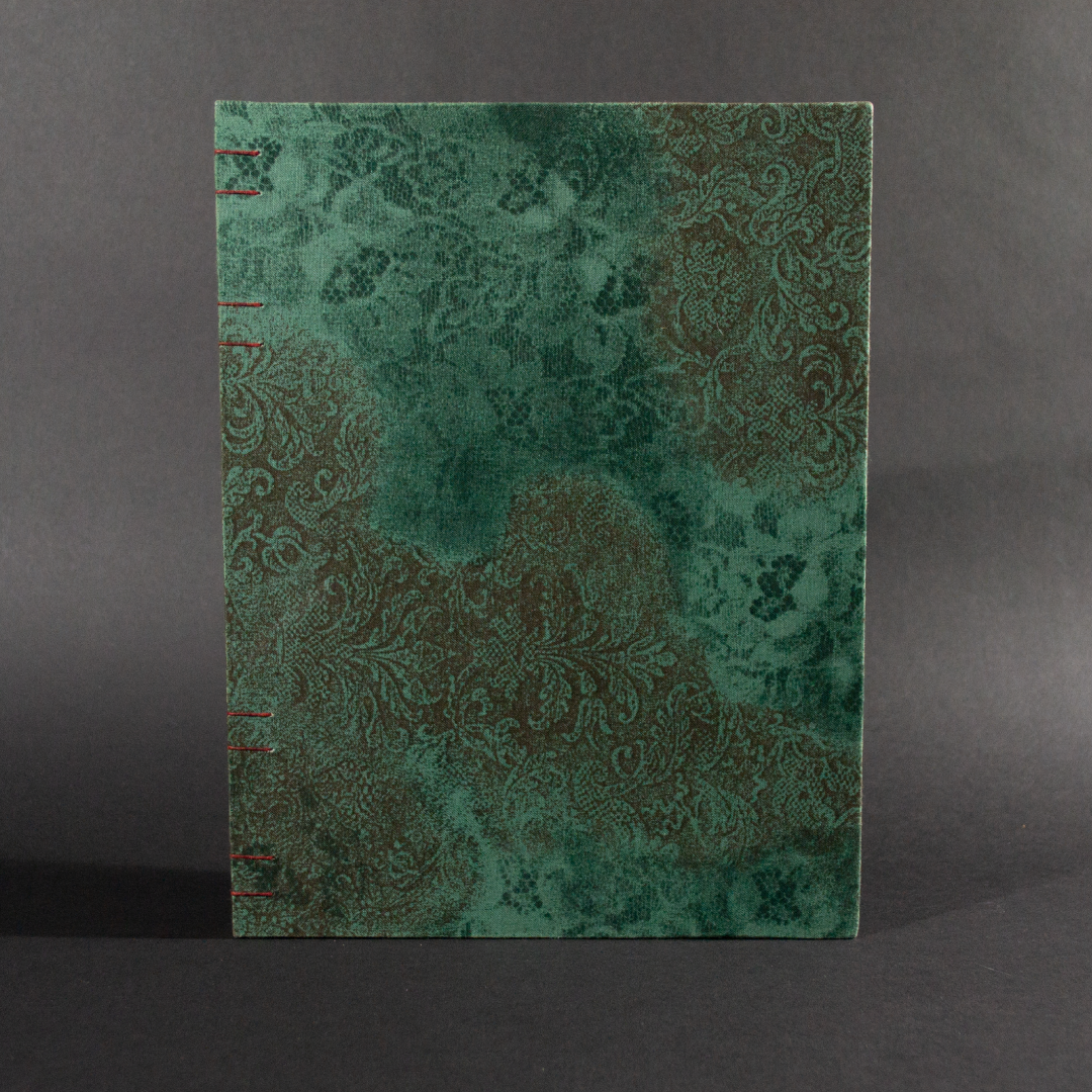 Front cover of vintage lace folio coptic journal