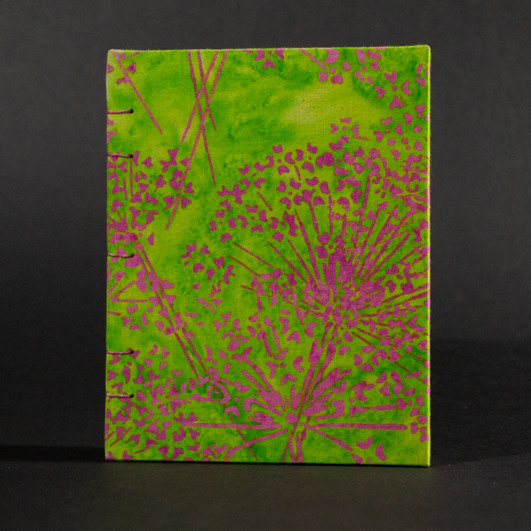Cover of pink and green floral batik octavo Coptic book