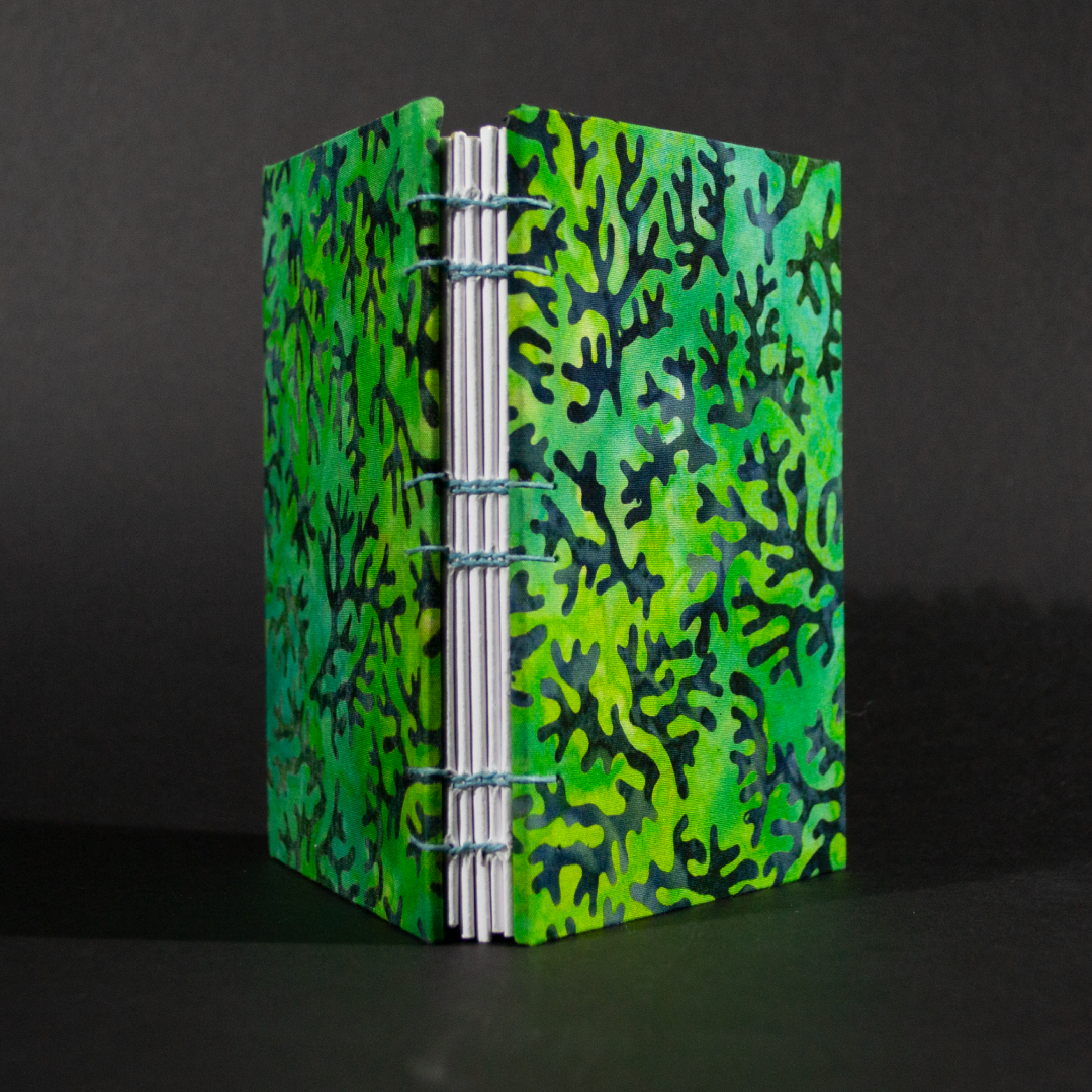 Spine of blue coral batik octavo Coptic book