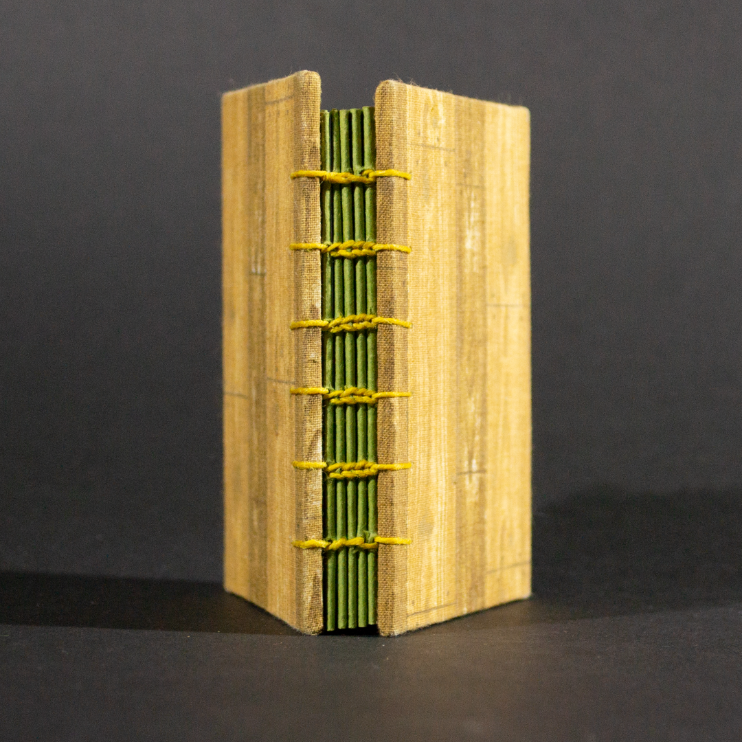 Spine view of wood floor Coptic book