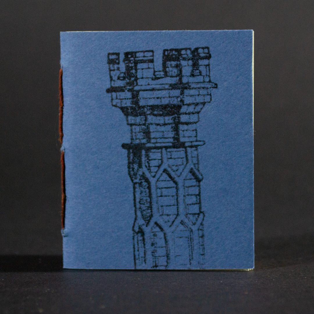 A blue column graces the front cover of this mini pamphlet book