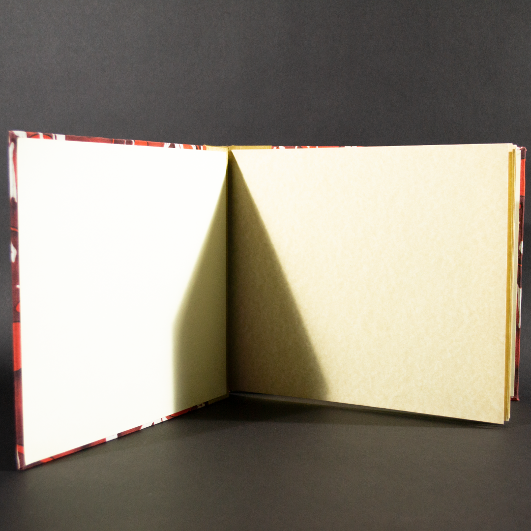 Stab bound Hawaiian photo album with ivory insides and end pages