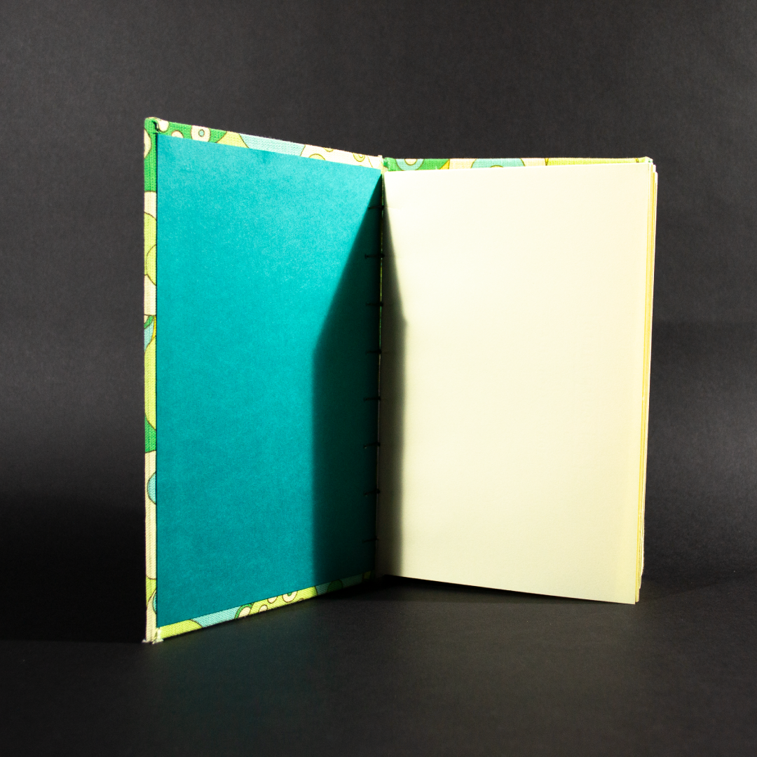 Retro circles quarto Coptic bound journal insides have blue end pages and ivory text pages