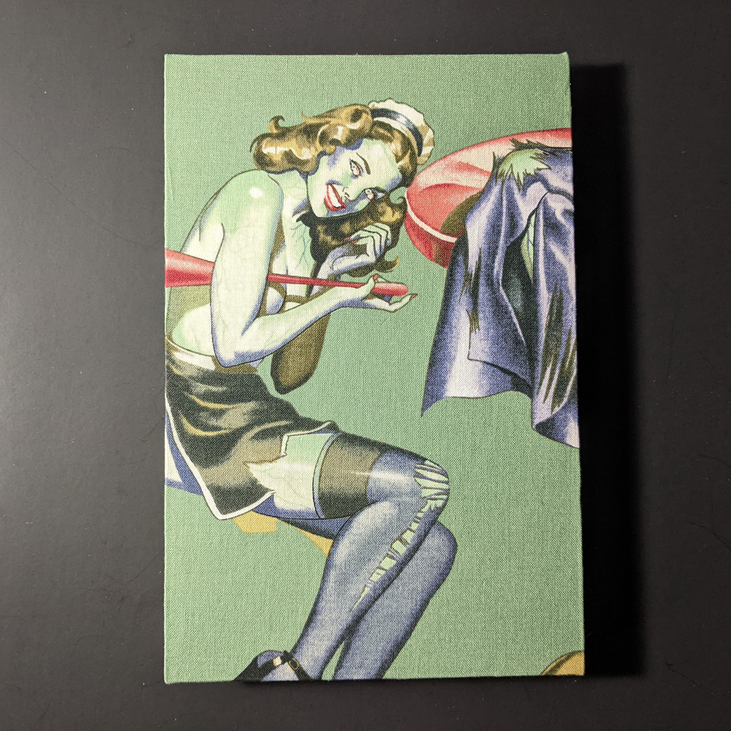 The front cover of retro circles quarto Coptic bound journal has a pine up zombie girl on a green background