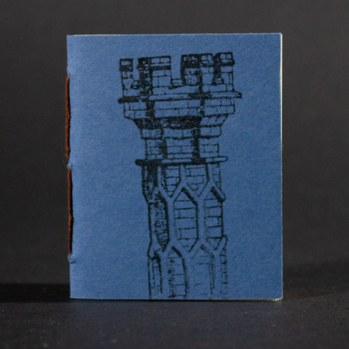 A blue column graces the front cover of this mini pamphlet book