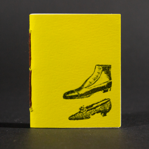 Two yellow shoes are on the cover of this mini pamphlet book